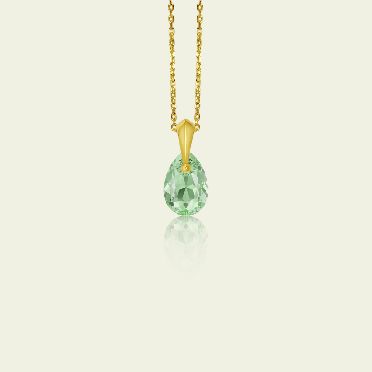 Gold pendant featuring an original Swarovski stone.